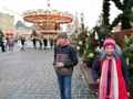 Фото на фоне новрогодней карусели. Москва, Красная площадь, декабрь 2019г